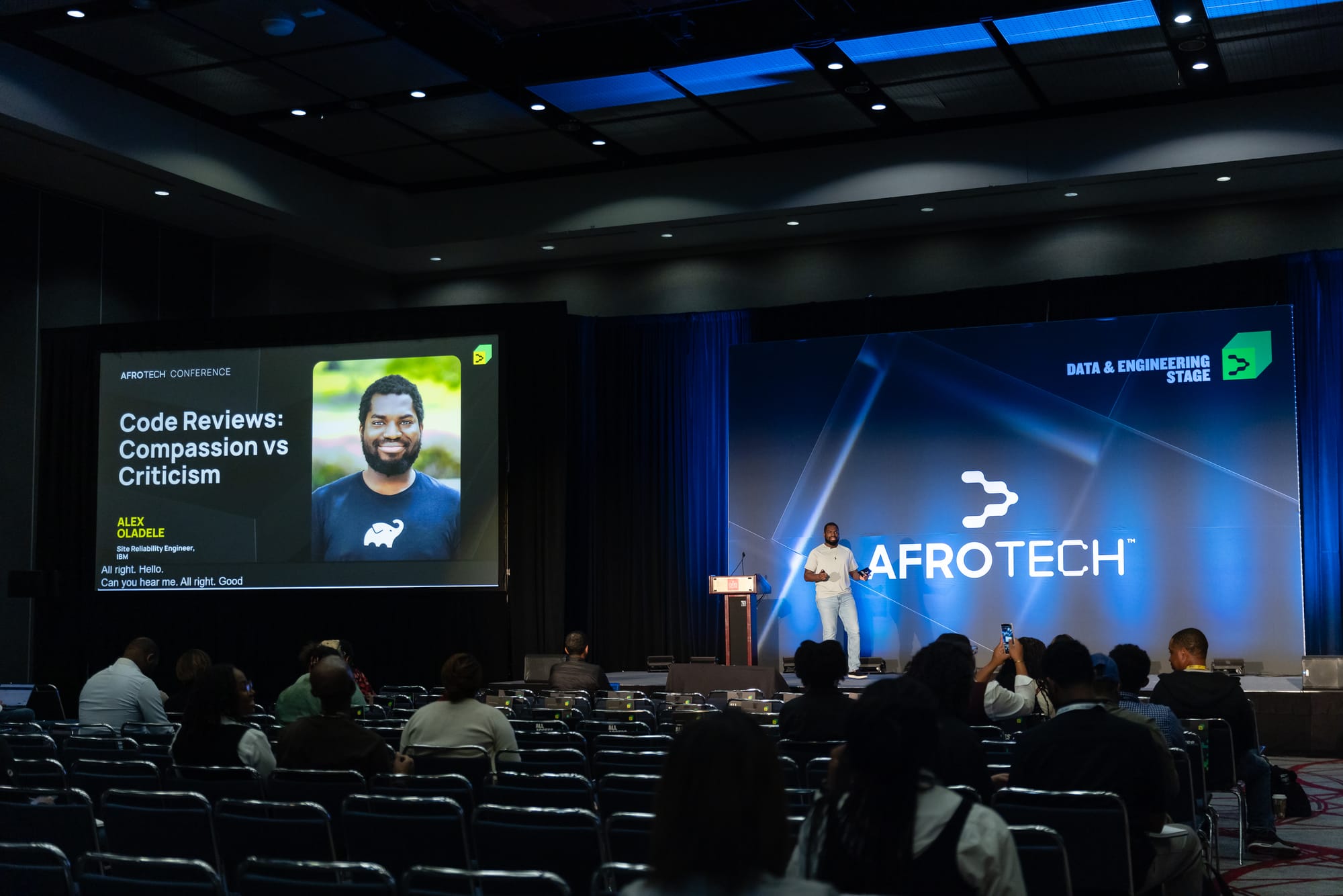Alex at the podium at AfroTech 2024