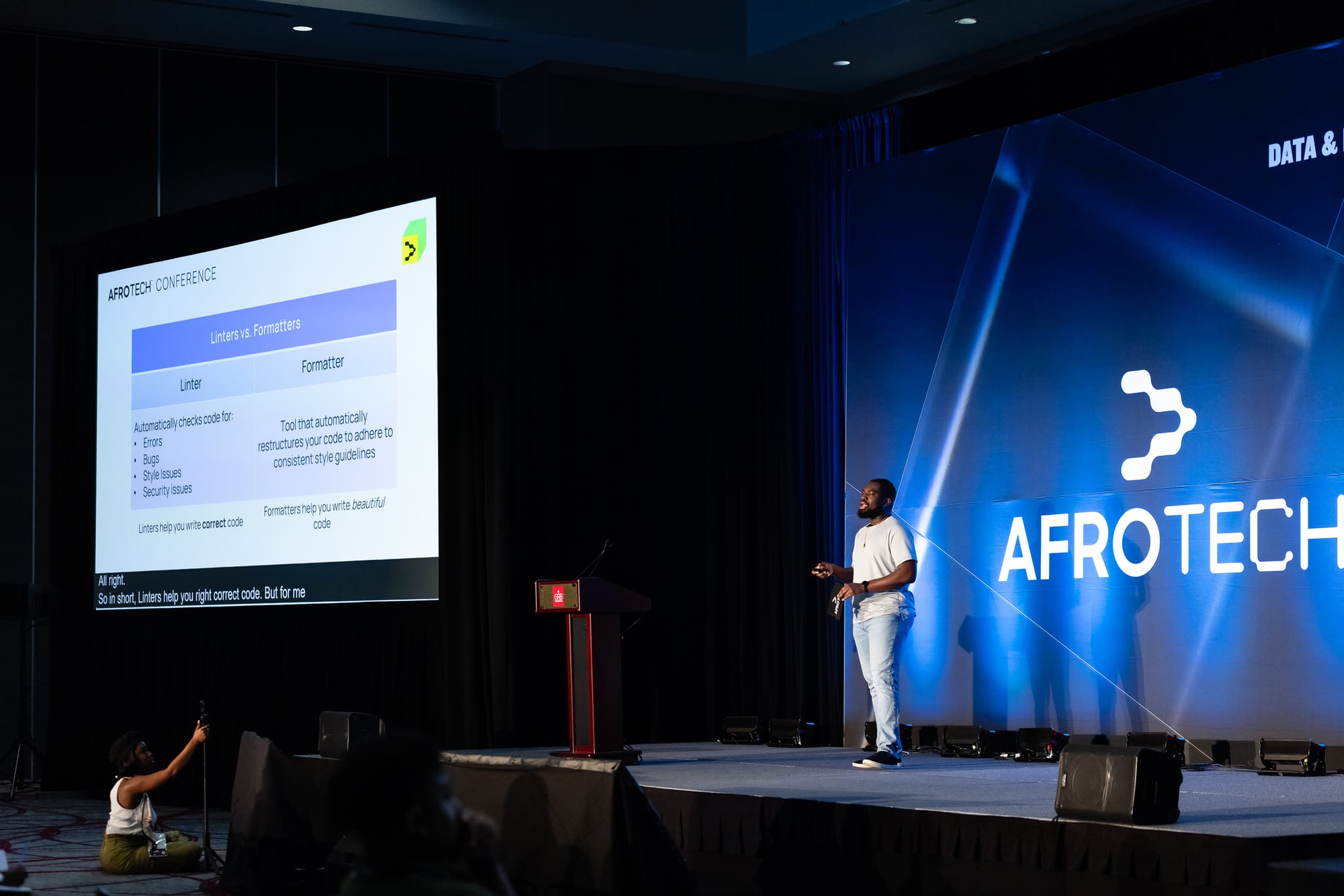 Alex engaging with the audience at AfroTech 2024