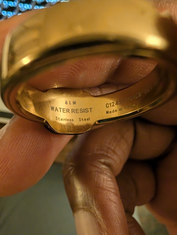 Close-up of the Pebble Index 01 ring showing its water-resistance marking
